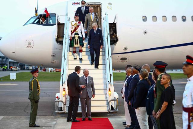 Britain's King Charles III is welcomed upon his arrival to the L.F. Wade International Airport in Hamilton, Bermuda, on April 30, 2026. King Charles III is in Bermuda for his first visit to a British Overseas Territory as Sovereign. (Photo by Henry NICHOLLS / AFP)