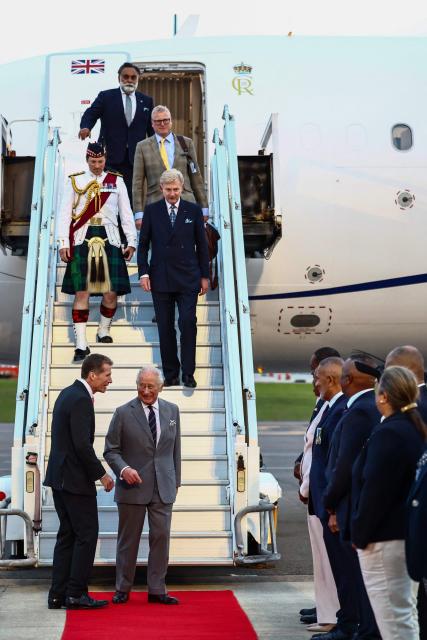 Britain's King Charles III is welcomed upon his arrival to the L.F. Wade International Airport in Hamilton, Bermuda, on April 30, 2026. King Charles III is in Bermuda for his first visit to a British Overseas Territory as Sovereign. (Photo by Henry NICHOLLS / AFP)