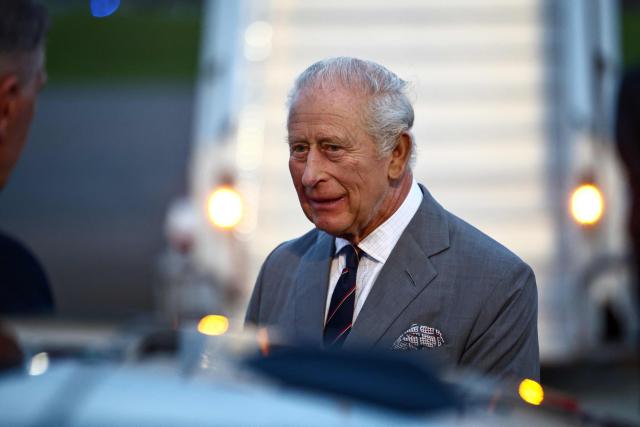 Britain's King Charles III walks toward his vehicle after arriving to the L.F. Wade International Airport in Hamilton, Bermuda, on April 30, 2026. King Charles III is in Bermuda for his first visit to a British Overseas Territory as Sovereign. (Photo by Henry NICHOLLS / AFP)