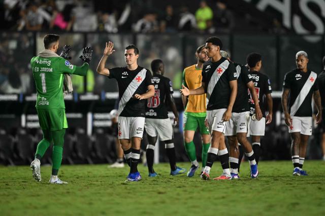 Vasco da Gama players celebrate after winning the Copa Sudamericana group stage football match between Brazil's Vasco da Gama and Paraguay's Olimpia at the Sao Januario stadium in Rio de Janeiro, Brazil on April 30, 2026. (Photo by MAURO PIMENTEL / AFP)