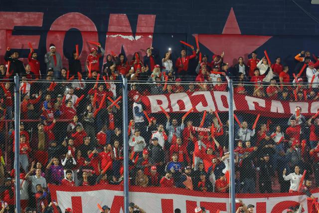 Fans of America de Cali cheer for their team ahead of the Copa Sudamericana group stage football match between Argentina's Tigre and Colombia's America de Cali at the Jose Dellagiovanna stadium in Victoria, Buenos Aires province, Argentina on April 30, 2026. (Photo by Alejandro PAGNI / AFP)