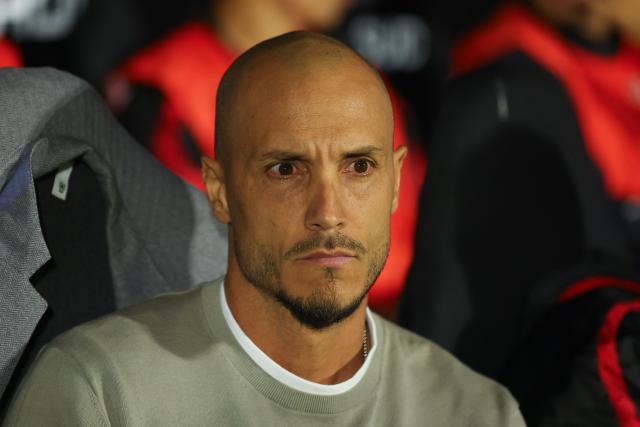 America de Cali's coach David Gonzalez looks on ahead of the Copa Sudamericana group stage football match between Argentina's Tigre and Colombia's America de Cali at the Jose Dellagiovanna stadium in Victoria, Buenos Aires province, Argentina on April 30, 2026. (Photo by Alejandro PAGNI / AFP)
