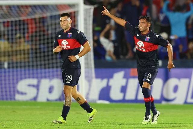 Tigre's forward #08 Martin Garay (R) celebrates scoring his team's first goal next to teammate forward #29 Ignacio Russo during the Copa Sudamericana group stage football match between Argentina's Tigre and Colombia's America de Cali at the Jose Dellagiovanna stadium in Victoria, Buenos Aires province, Argentina on April 30, 2026. (Photo by Alejandro PAGNI / AFP)