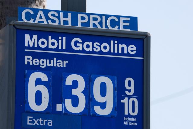 Regular cash gasoline prices above $6 per gallon are displayed outside a Mobil gas station in Redondo Beach, California on April 30, 2026. Energy costs have surged since the near-total closure of the Strait of Hormuz, through which about a fifth of the world's oil and gas usually passes, following the outbreak of the US-Israeli war against Iran. (Photo by Patrick T. Fallon / AFP)