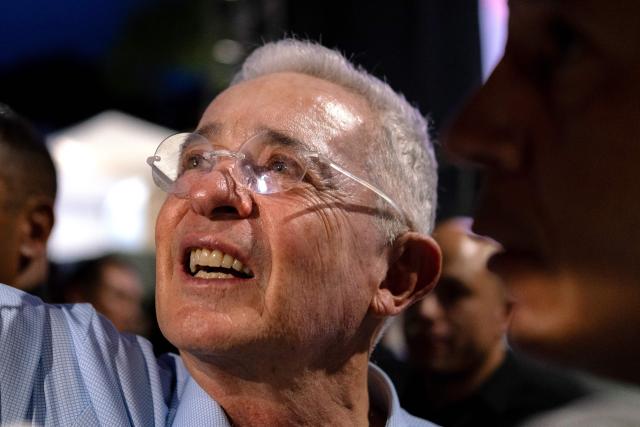 Former Colombia's President Alvaro Uribe gestures during a campaign rally of presidential candidate Paloma Valencia, of the Centro Democratico party, in Villavicencio, Meta department, Colombia on April 30, 2026. Colombia will hold a presidential election on May 31, 2026. (Photo by Mario Toro / AFP)