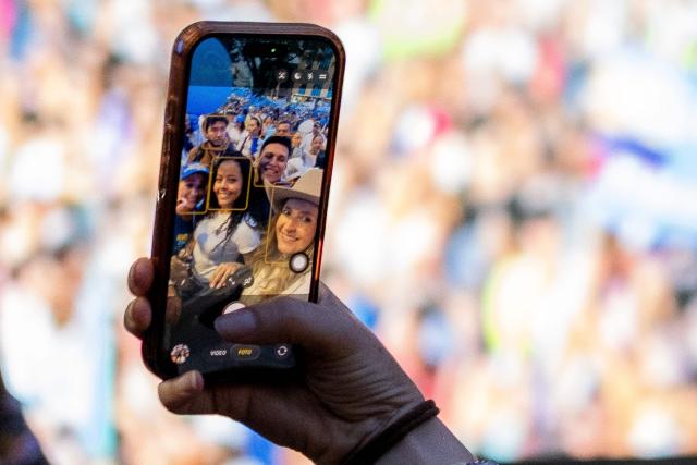 A view of a cellphone with which Colombia's presidential candidate Paloma Valencia, of the Centro Democratico party, takes a selfie during a campaign rally in Villavicencio, Meta department, Colombia on April 30, 2026. Colombia will hold a presidential election on May 31, 2026. (Photo by Mario Toro / AFP)