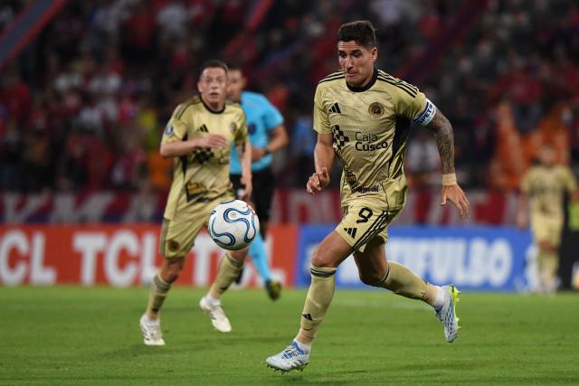 Independiente Medellin's Uruguayan forward #09 Enzo Larrosa runs with the ball during the Copa Libertadores group stage football match between Colombia's Independiente Medellin and Peru's Cusco FC at the Atanasio Girardot stadium in Medellin, Antioquia department, Colombia on April 30, 2026. (Photo by Jaime SALDARRIAGA / AFP)