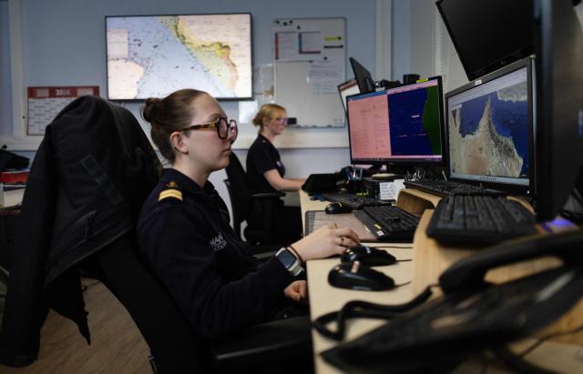 Workers of the Maritime International Cooperation and Awareness (MICA) center look at screens at the MICA in Brest, western France on April 27, 2026. Attacks on oil tankers in the Strait of Hormuz, piracy off the coast of Somalia, drug trafficking: with their eyes fixed on screens crammed with maps, a dozen sailors at the MICA Centre monitor the worlds maritime hotspots in real time.
Since the start of the war in the Middle East, triggered by Israeli-American strikes on Iran on February 28, 2026, this French centre of expertise in maritime security, attached to the French Navy, has been providing invaluable support to civilian vessels and crews stranded in the Persian Gulf. (Photo by Fred TANNEAU / AFP)