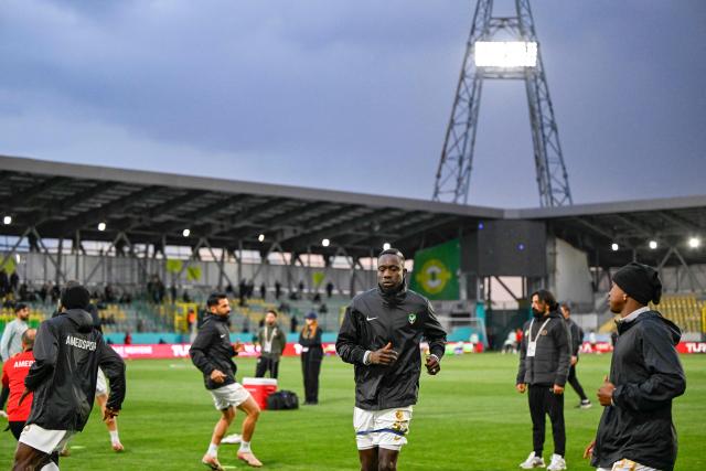 Amedspor's players warm up ahead of the Trendyol League football match between Amedspor and Esenler Erokspor at the Esenler Erokspor Stadium, in the Esenler district of Istanbul, on April 9, 2026. Amedspor, a club from Diyarbakir, the "capital" of Turkey's predominantly Kurdish southeast, can secure promotion to the first division on May 2, 2026, an unprecedented prospect that has sparked a wave of enthusiasm among the country's millions of Kurds. (Photo by Yasin AKGUL / AFP)