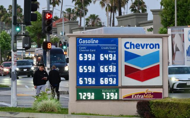 Gas prices above $6 per gallon are displayed at s Chevron station in Monterey Park, California, on April 30, 2026. Energy costs have surged since the near-total closure of the Strait of Hormuz, through which about a fifth of the world's oil and gas usually passes, following the outbreak of the US-Israeli war against Iran. (Photo by Frederic J. BROWN / AFP)