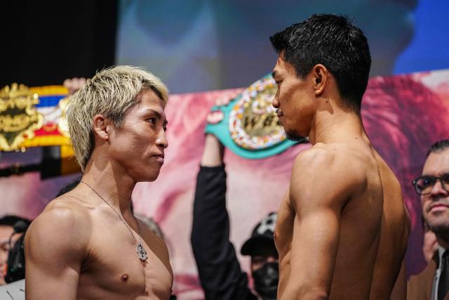Japanese boxer Naoya Inoue (L) and Junto Nakatani pose for photographs following a weigh-in ahead of their May 2 boxing match in Tokyo on May 1, 2026. (Photo by Yuichi YAMAZAKI / AFP)