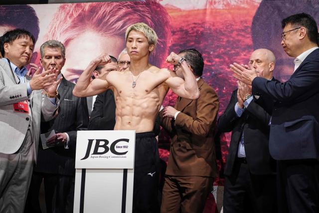 Japanese boxer Naoya Inoue (C) poses for photographs during a weigh-in ahead of his May 2 boxing match with Junto Nakatani in Tokyo on May 1, 2026. (Photo by Yuichi YAMAZAKI / AFP)