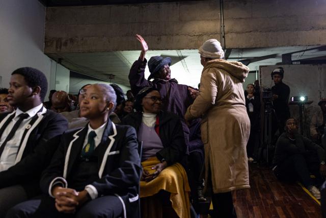 Antoinette Sithole (R), sister of Hector Pieterson, greets a fellow veteran of the June 16, 1976 Soweto Uprising, at the launch of “Finishing What Was Started”, an event reflecting on the legacy of the June 1976 generation and a call to action for today’s youth, at the Hector Pieterson Museum in Soweto on April 30, 2026. (Photo by EMMANUEL CROSET / AFP)