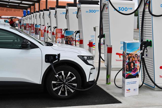 (FILES) This photograph taken on August 4, 2023, shows charging stations for electric cars at the highway service area of Limours-Janvry, south of Paris. New electric car sales in France jumped 48 percent year-on-year in the first four months of the year to 148,302 units, even as the broader automotive market struggled, the automotive industry body PFA, which represents all carmakers, said on May 1, 2026. (Photo by MIGUEL MEDINA / AFP)