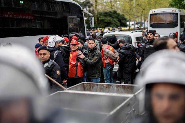 Turkish police detain protestors during a May Day (Labour Day) rally, marking international Workers' Day, in Besiktas, a district of Istanbul, on May 1, 2026. (Photo by BERK OZKAN / AFP)