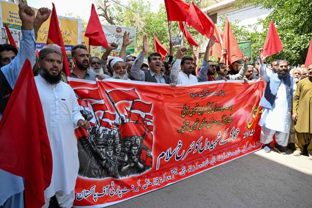 Pakistan Workers Federation (PWF) activists shout slogans during a march to mark International Labour Day, in Quetta on May 1, 2026. (Photo by Banaras KHAN / AFP)