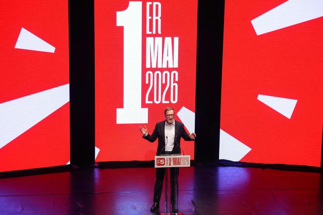 President of the Belgian Socialist Party, Paul Magnette, gestures as he speaks during a meeting marking May Day (Labour Day), International Workers' Day, in Charleroi on May 1, 2026. (Photo by VIRGINIE LEFOUR / Belga / AFP) / Belgium OUT