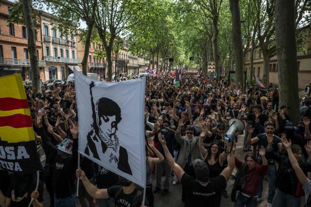 Members of an anti-fascist group take part in a May Day (Labour Day) rally, marking International Workers' Day, in Toulouse on May 1, 2026. (Photo by Ed JONES / AFP)