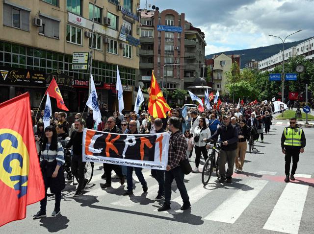Members of North Macedonian trade unions and demonstrators take part in a rally for workers' rights on May day (or Labor Day) marking International Workers' Day in Skopje on May 1, 2026. (Photo by Robert ATANASOVSKI / AFP)