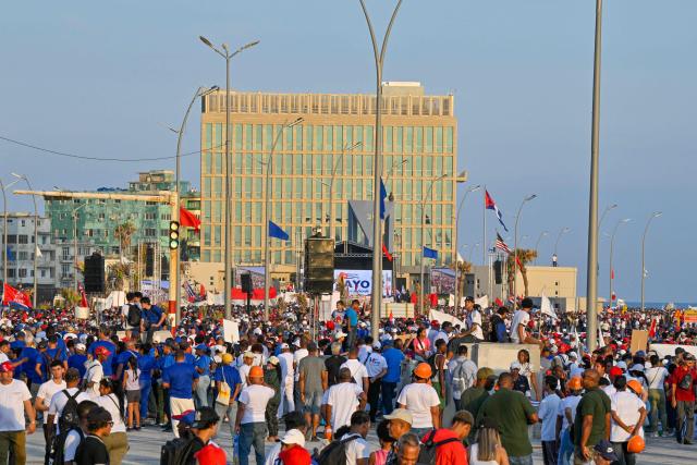 People march to mark Labor Day at the Anti-Imperialist Tribunal in front of the US Embassy in Havana on May 1, 2026. (Photo by ADALBERTO ROQUE / AFP)