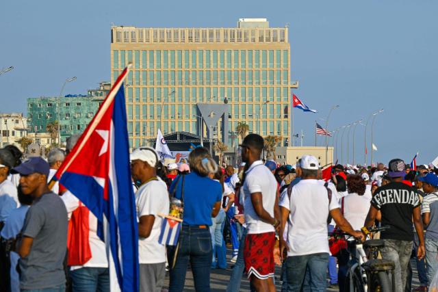 People march to mark Labor Day at the Anti-Imperialist Tribunal in front of the US Embassy in Havana on May 1, 2026. (Photo by ADALBERTO ROQUE / AFP)