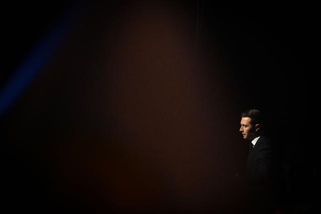 French far-right party Rassemblement National (RN) president Jordan Bardella arrives to deliver a speech during the "Fete de la nation" meeting in Macon on May 1, 2026. (Photo by OLIVIER CHASSIGNOLE / AFP)