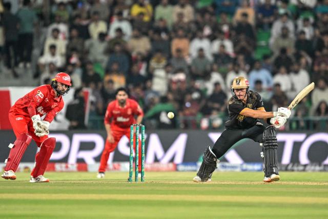 Hyderabad Kingsmen's captain Australia cricket player Marnus Labuschagne (R) plays a shot during the Pakistan Super League (PSL) Twenty20 second Eliminator match between Hyderabad Kingsmen and Islamabad United at the Gaddafi Stadium in Lahore on May 1, 2026. (Photo by Arif ALI / AFP)