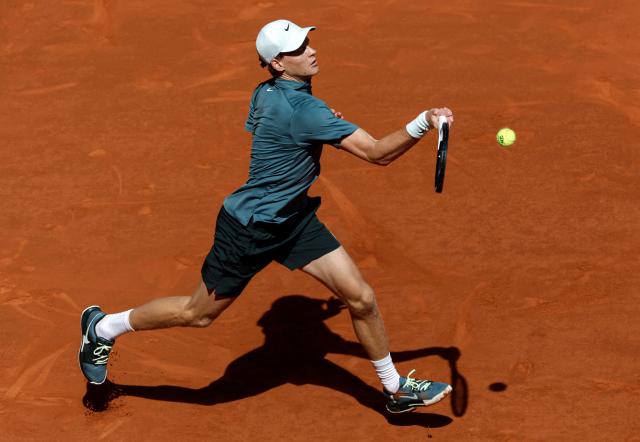 Italy's Jannik Sinner returns a ball to France's Arthur Fils during their 2026 ATP Tour Madrid Open tennis tournament semi-final singles match at the Caja Magica in Madrid, on May 1, 2026. (Photo by OSCAR DEL POZO / AFP)