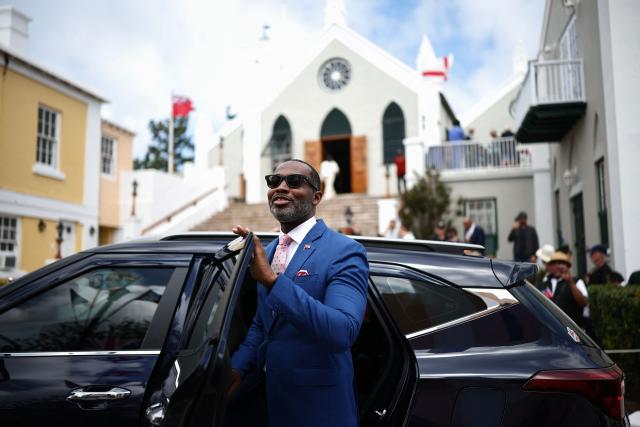 Premier of Bermuda David Burt greets people during a ceremonial welcome of the Britain's King Charles III at King's Square in St. George's, Bermuda, on May 1, 2026. King Charles III is in Bermuda for his first visit to a British Overseas Territory as Sovereign. (Photo by HENRY NICHOLLS / POOL / AFP)