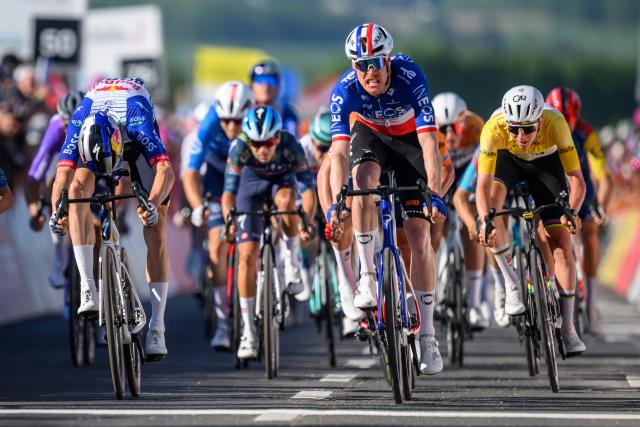 INEOS Grenadiers’ French rider Dorion Godon (2nd R) sprints to win in the third stage of the Tour of Romandie UCI cycling World tour, a 176.6 km loop departing and arriving in Orbe, Switzerland, on May, 1, 2026. (Photo by Fabrice COFFRINI / AFP)