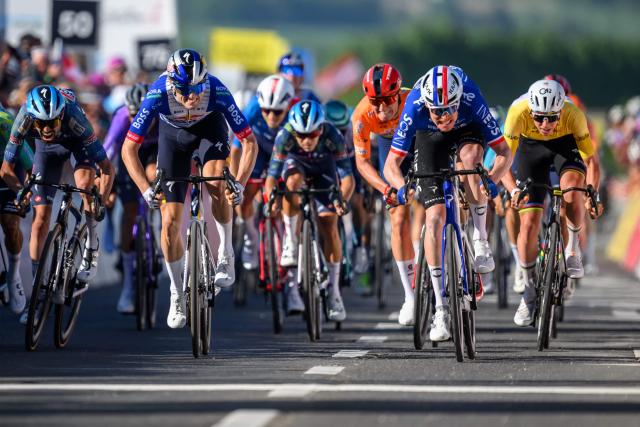 INEOS Grenadiers’ French rider Dorion Godon (2nd R) sprints to win in the third stage of the Tour of Romandie UCI cycling World tour, a 176.6 km loop departing and arriving in Orbe, Switzerland, on May, 1, 2026. (Photo by Fabrice COFFRINI / AFP)