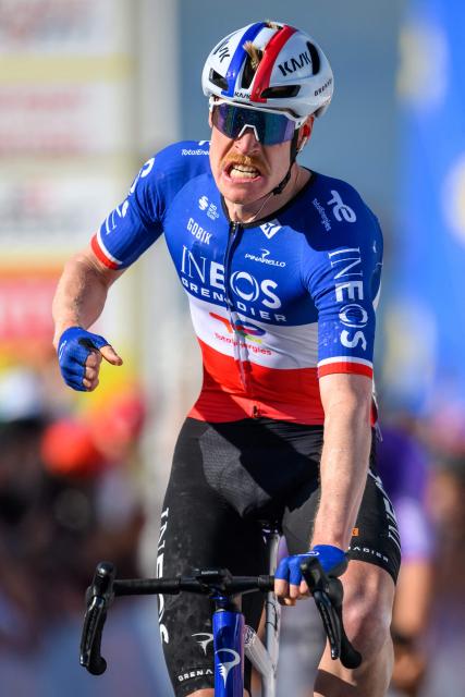 INEOS Grenadiers’ French rider Dorion Godon celebrates after crossing the finish line of the third stage of the Tour of Romandie UCI cycling World tour, a 176.6 km loop departing and arriving in Orbe, Switzerland, on May, 1, 2026. (Photo by Fabrice COFFRINI / AFP)
