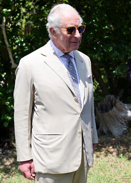 Britain's King Charles III speaks with students during a visit to a ‘Living Classroom’ on Trunk Island on May 1, 2026 in Hamilton, Bermuda. King Charles III is in Bermuda for his first visit to a British Overseas Territory as Sovereign. (Photo by Chris Jackson / POOL / AFP)