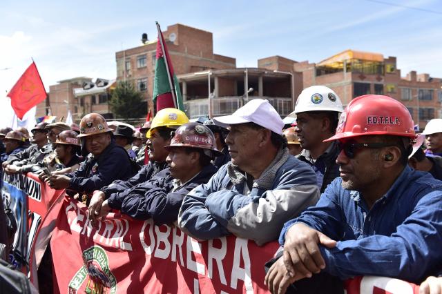 Workers take part in a rally organized by the Bolivian Workers Central (COB) to mark International Workers Day, with teachers, factory workers and miners participating, in El Alto, Bolivia, on May 1, 2026. (Photo by Jorge BERNAL / AFP)
