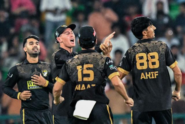 Hyderabad Kingsmen's captain Australia cricket player Marnus Labuschagne (2L) and his teammates celebrate after the dismissal of Islamabad United's Pakistani cricket player Sameer Minhas during the Pakistan Super League (PSL) Twenty20 second Eliminator match between Hyderabad Kingsmen and Islamabad United at the Gaddafi Stadium in Lahore on May 1, 2026. (Photo by Arif ALI / AFP)