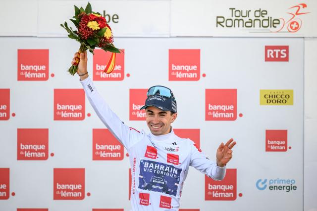 Bahrain Victorious’ French rider Lenny Martinez wearing the best young rider's white jersey reacts during the podium ceremony of the third stage of the Tour of Romandie UCI cycling World tour, a 176.6 km loop departing and arriving in Orbe, Switzerland, on May, 1, 2026. (Photo by Fabrice COFFRINI / AFP)