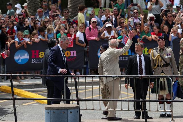 Britain's King Charles greets supporters during his visit in Hamilton, Bermuda, on May 1, 2026. King Charles III is in Bermuda for his first visit to a British Overseas Territory as Sovereign. (Photo by Suzanne Plunkett / POOL / AFP)
