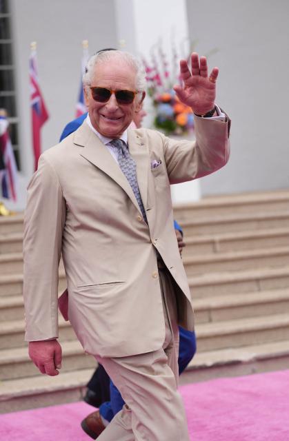 King Charles III leaves after a visit to the City Hall and Arts Centre on May 1, 2026 in Hamilton, Bermuda. King Charles III is in Bermuda for his first visit to a British Overseas Territory as Sovereign. (Photo by Yui Mok / POOL / AFP)