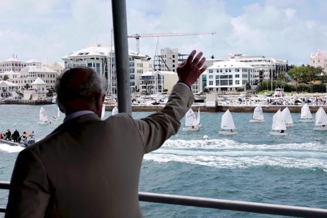 Britain's King Charles III waves as he takes a ferry crossing on May 1, 2026 in Hamilton, Bermuda. King Charles III is in Bermuda for his first visit to a British Overseas Territory as Sovereign. (Photo by Chris Jackson / POOL / AFP)