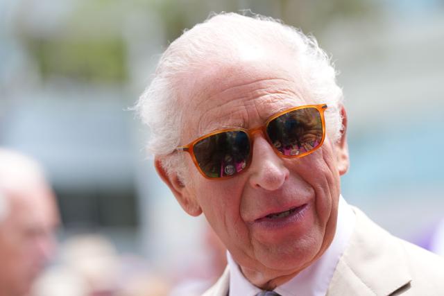 Britain's King Charles III arrives for a visit to the City Hall and Arts Centre on May 1, 2026 in Hamilton, Bermuda. King Charles III is in Bermuda for his first visit to a British Overseas Territory as Sovereign. (Photo by Yui Mok / POOL / AFP)