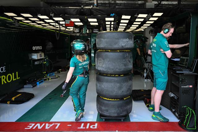 Aston Martin technicians work in the garage of Aston Martin's Canadian driver Lance Stroll during a practice session for the 2026 Miami Formula One Grand Prix at Miami International Autodrome in Miami Gardens, Florida, on May 1, 2026. (Photo by CHANDAN KHANNA / AFP)
