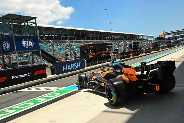 McLaren's Australian driver Oscar Piastri pulls out of his garage in pit lane during a practice session for the 2026 Miami Formula One Grand Prix at Miami International Autodrome in Miami Gardens, Florida, on May 1, 2026. (Photo by CHANDAN KHANNA / AFP)