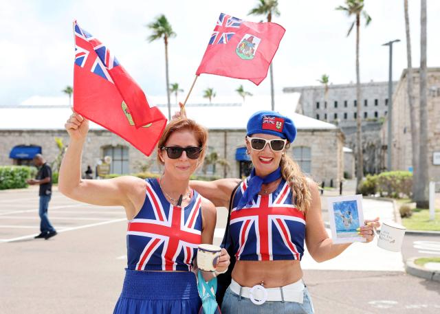 Members of the public await the arrival of King Charles III from a ferry crossing, in Hamilton, Bermuda on May 1, 2026. King Charles III is in Bermuda for his first visit to a British Overseas Territory as Sovereign. (Photo by Chris Jackson / POOL / AFP)