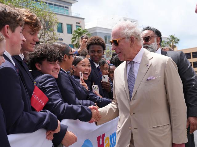 Britain's King Charles on a ferry on his way to Royal Naval Dockyard, in Hamilton Bermuda, May 1, 2026. King Charles III is in Bermuda for his first visit to a British Overseas Territory as Sovereign. (Photo by Yui Mok / POOL / AFP)