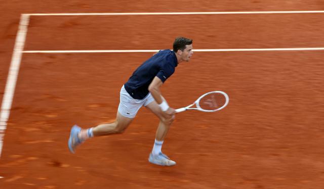 Belgium's Alexander Blockx returns the ball to Germany's Alexander Zverev during their 2026 ATP Tour Madrid Open tennis tournament semi-final singles match at the Caja Magica in Madrid, on May 1, 2026. (Photo by Thomas COEX / AFP)
