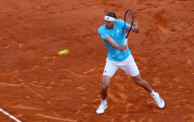 Germany's Alexander Zverev returns the ball to Belgium's Alexander Blockx during their 2026 ATP Tour Madrid Open tennis tournament semi-final singles match at the Caja Magica in Madrid, on May 1, 2026. (Photo by Thomas COEX / AFP)