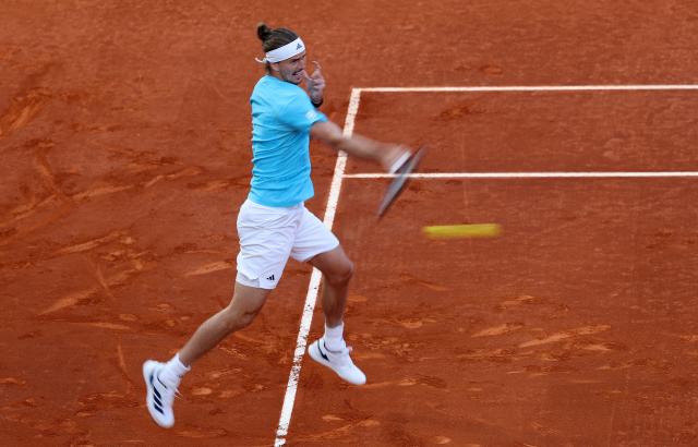 Germany's Alexander Zverev returns the ball to Belgium's Alexander Blockx during their 2026 ATP Tour Madrid Open tennis tournament semi-final singles match at the Caja Magica in Madrid, on May 1, 2026. (Photo by Thomas COEX / AFP)
