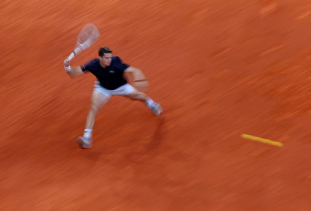 Belgium's Alexander Blockx returns the ball to Germany's Alexander Zverev during their 2026 ATP Tour Madrid Open tennis tournament semi-final singles match at the Caja Magica in Madrid, on May 1, 2026. (Photo by Thomas COEX / AFP)