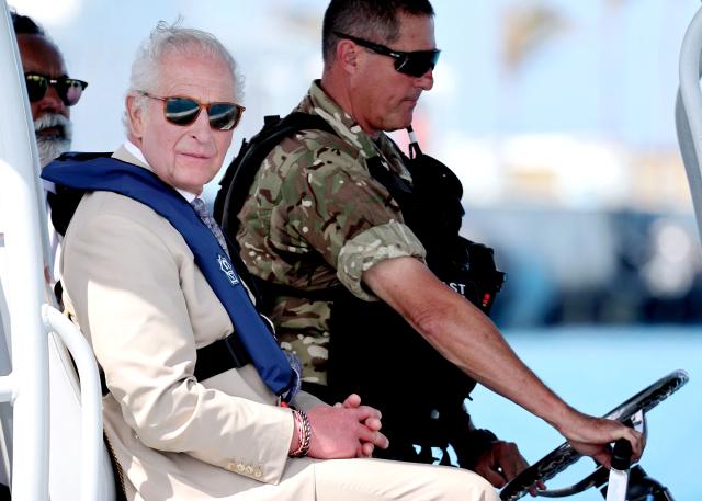 Britain's King Charles III onboard the Coast Guard’s console boat during a Coast Guard briefing on May 1, 2026 in Hamilton, Bermuda. King Charles III is in Bermuda for his first visit to a British Overseas Territory as Sovereign. (Photo by Chris Jackson / POOL / AFP)