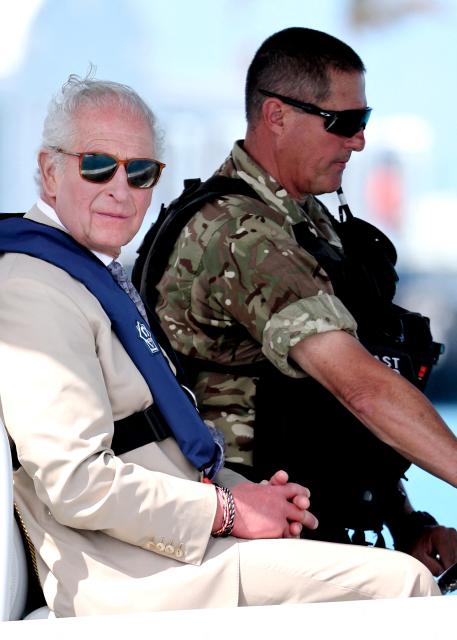Britain's King Charles III onboard the Coast Guard’s console boat during a Coast Guard briefing on May 1, 2026 in Hamilton, Bermuda. King Charles III is in Bermuda for his first visit to a British Overseas Territory as Sovereign. (Photo by Chris Jackson / POOL / AFP)